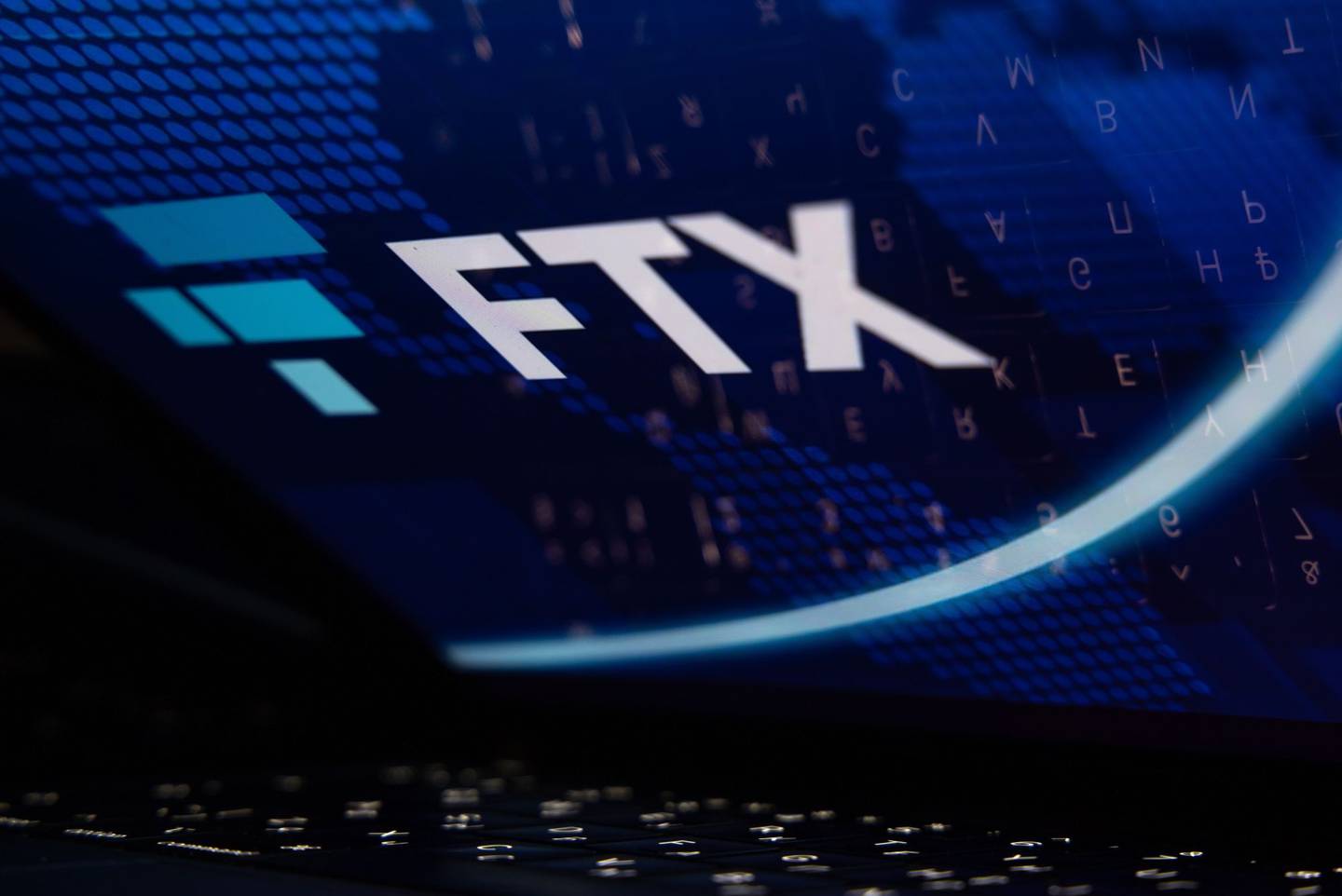 The FTX Cryptocurrency Derivatives Exchange logo on a laptop screen arranged in Riga, Latvia, Nov. 24, 2022. The implosion of Sam Bankman-Frieds FTX empire dealt a harsh blow to the Bahamas ambitions to be a hub for the crypto industry, and its causing massive pain for locals who treated the now-bankrupt exchange like a bank. Photographer: Andrey Rudakov/Bloomberg