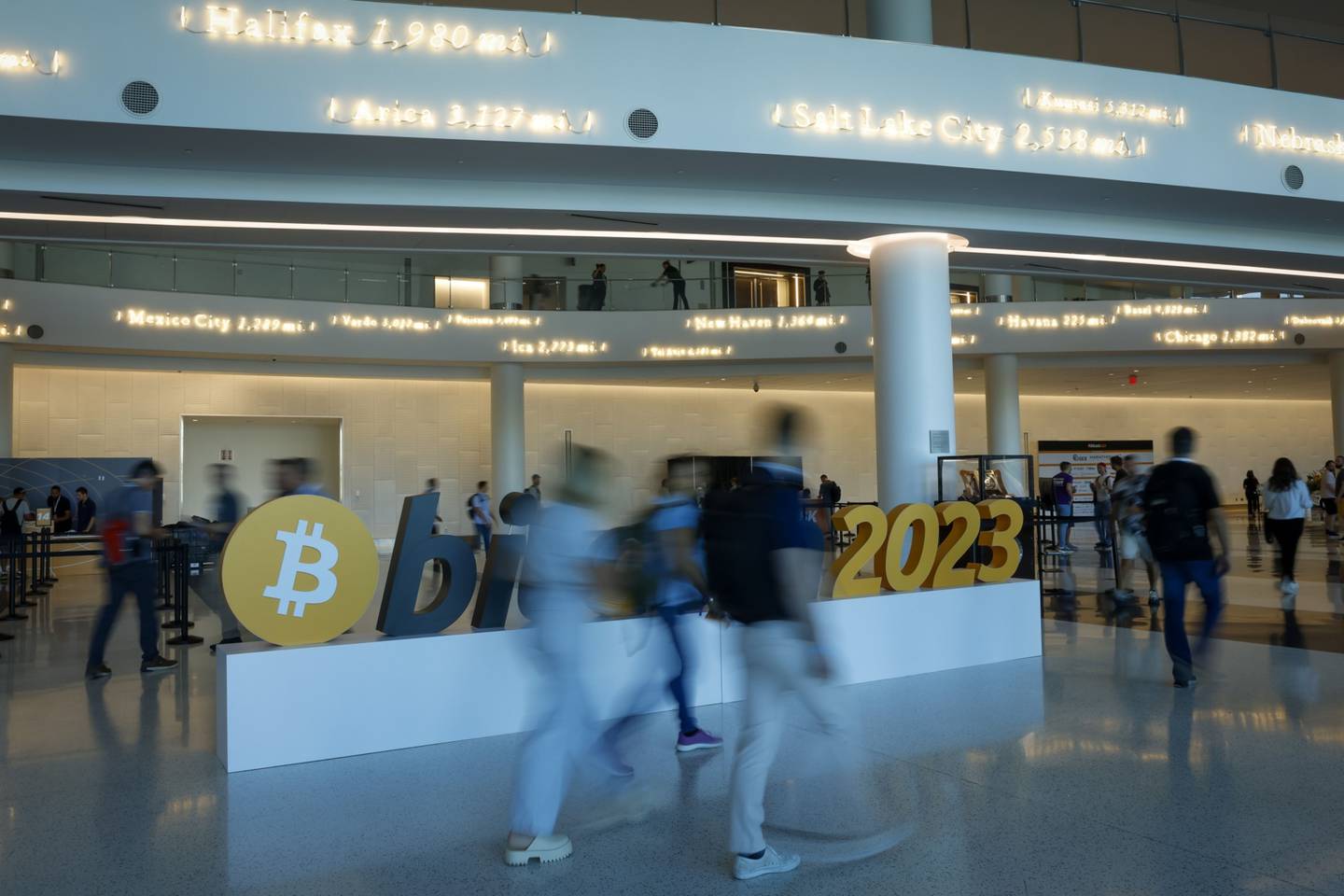 Attendees arrive at the Bitcoin 2023 conference in Miami Beach, Florida.