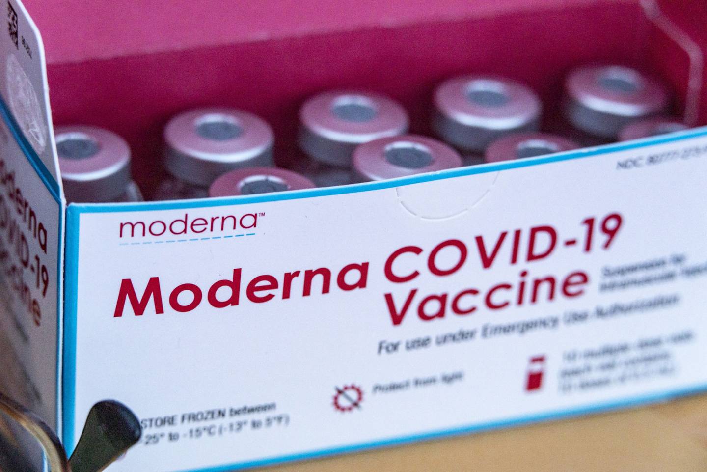 A box of the Moderna Covid-19 vaccine vials at a drive-thru vaccination site at the Meigs County fairgrounds in Pomeroy, Ohio, U.S., on Thursday, March 18, 2021.