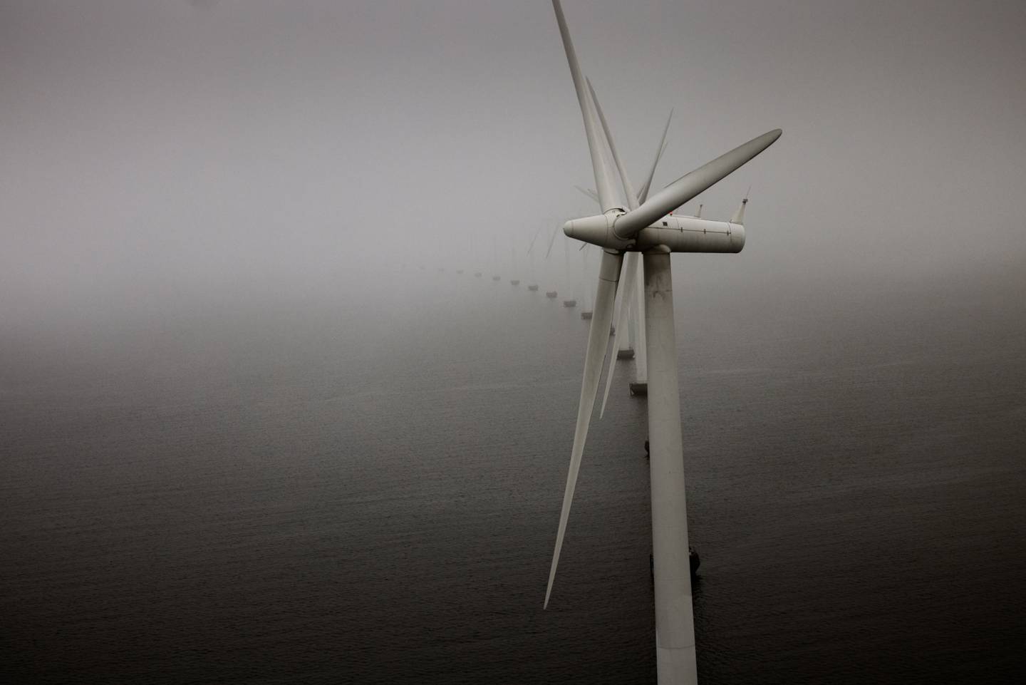 Offshore wind turbines at the Middelgrunden wind farm off the coast of Copenhagen, Denmark,