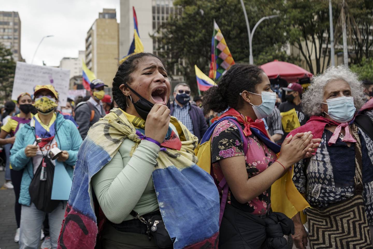 Demonstrators shout slogans during an anti-government protest in Bogota, Colombia, on Tuesday, July 20, 2021. Unions have organized nationwide protests on Colombia's Independence Day, as thegovernment presents a new tax bill to Congress after the last proposal was withdrawn amid a backlash. Photographer: Carlos Bernate/Bloomberg