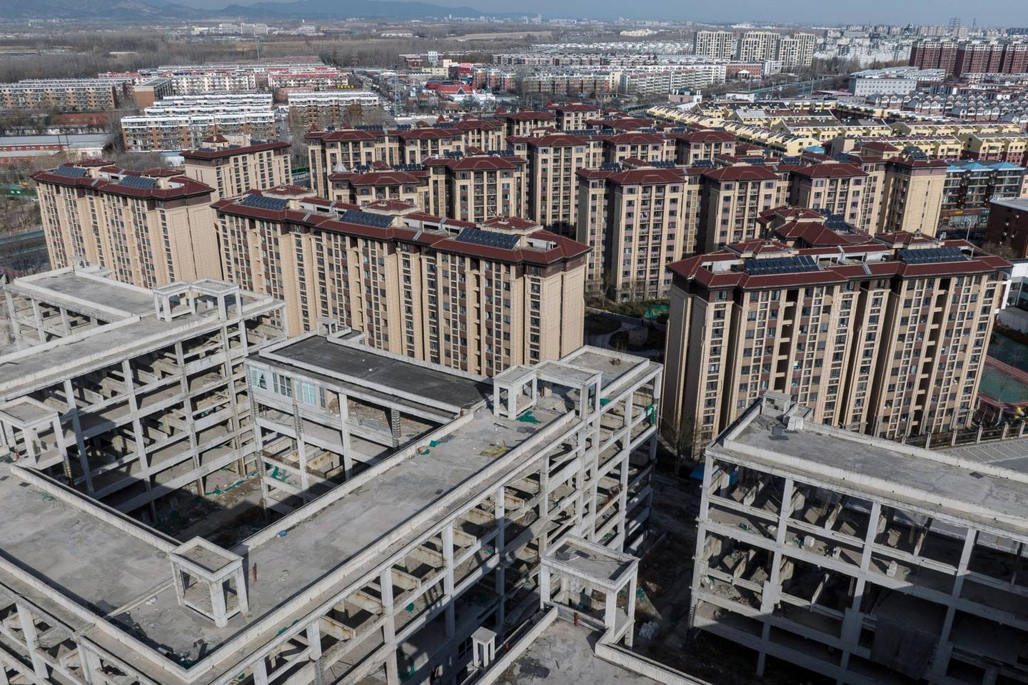 Las autoridades chinas están planeando introducir nuevas medidas de apoyo para aliviar las tensiones de liquidez en algunos de los promotores inmobiliarios