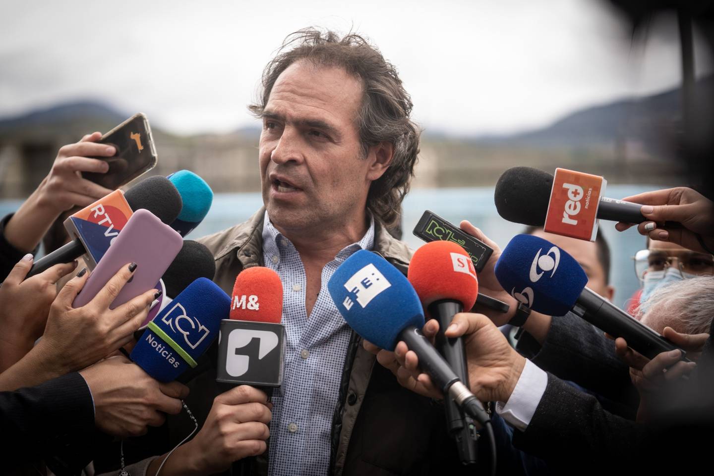Federico Gutierrez speaks during a news conference outside the La Picota prison in Bogota, on April 18.