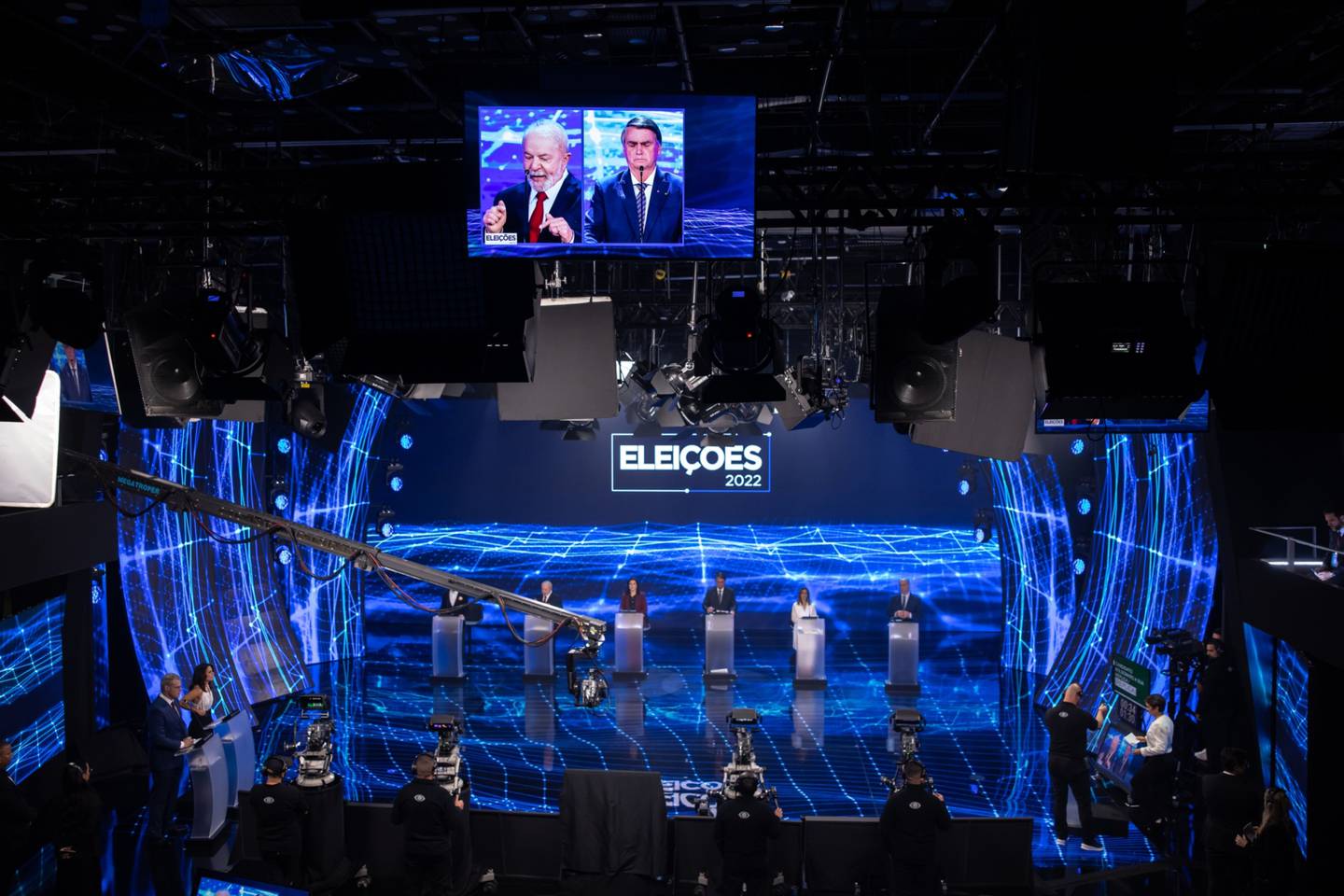 Images of Jair Bolsonaro, Brazil's president, and Luiz Inacio Lula da Silva, Brazil's former president, on the screen during the first televised presidential debate in Sao Paulo.