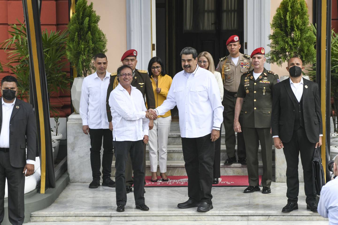 Nicolas Maduro, Venezuela's president, right, and Gustavo Petro, Colombia's president, left, shake hands at Miraflores Palace in Caracas, Venezuela, on Saturday, Jan. 7, 2023.