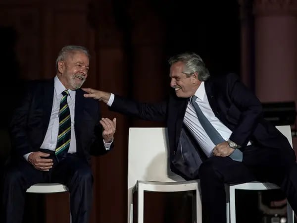 Luiz Inacio Lula da Silva and Alberto Fernandez, smile during a Day of Democracy and Human Rights event in Buenos Aires, Argentina, on Friday, Dec. 10, 2021.