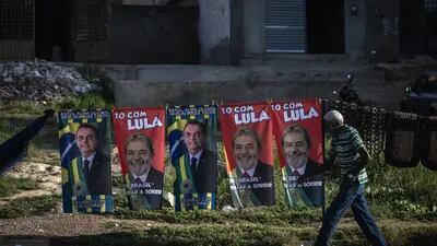 A street vendor sells towels depicting Brazil's President Jair Bolsonaro, and former president Luiz Inácio Lula da Silva, fnear Salgueiro, Pernambuco state. Brazil's elections are shaping up to be a contest between opposing poles of the political spectrum to determine the direction of Latin America's largest economy at a time of change.