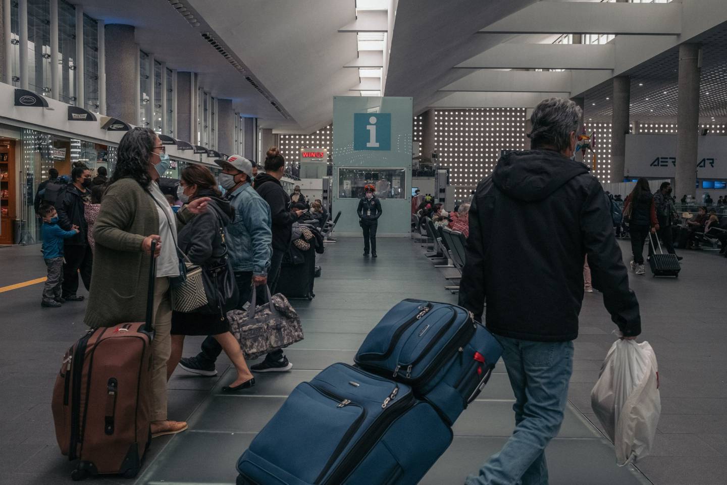 Viajeros en el Aeropuerto Internacional Benito Juárez (MEX) en la Ciudad de México, México, el lunes 10 de enero de 2022. Fotógrafo: Jeoffrey Guillemard/Bloomberg
