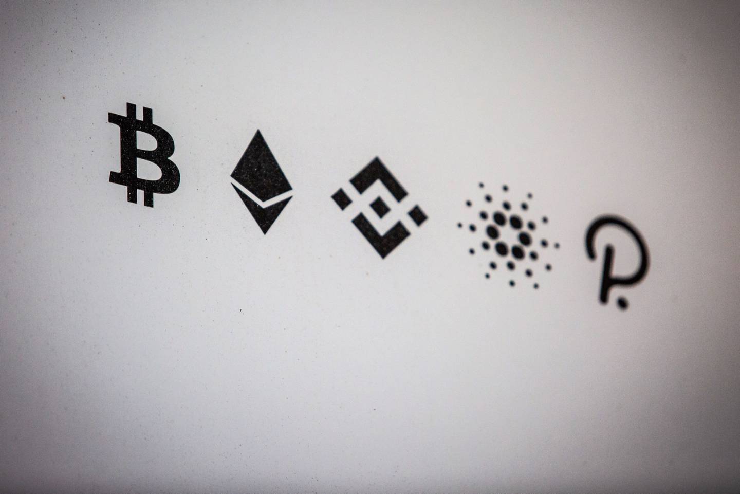 Cryptocurrency logos for Bitcoin, Ethereum, Binance Coin, Cardano, and Polkadot.