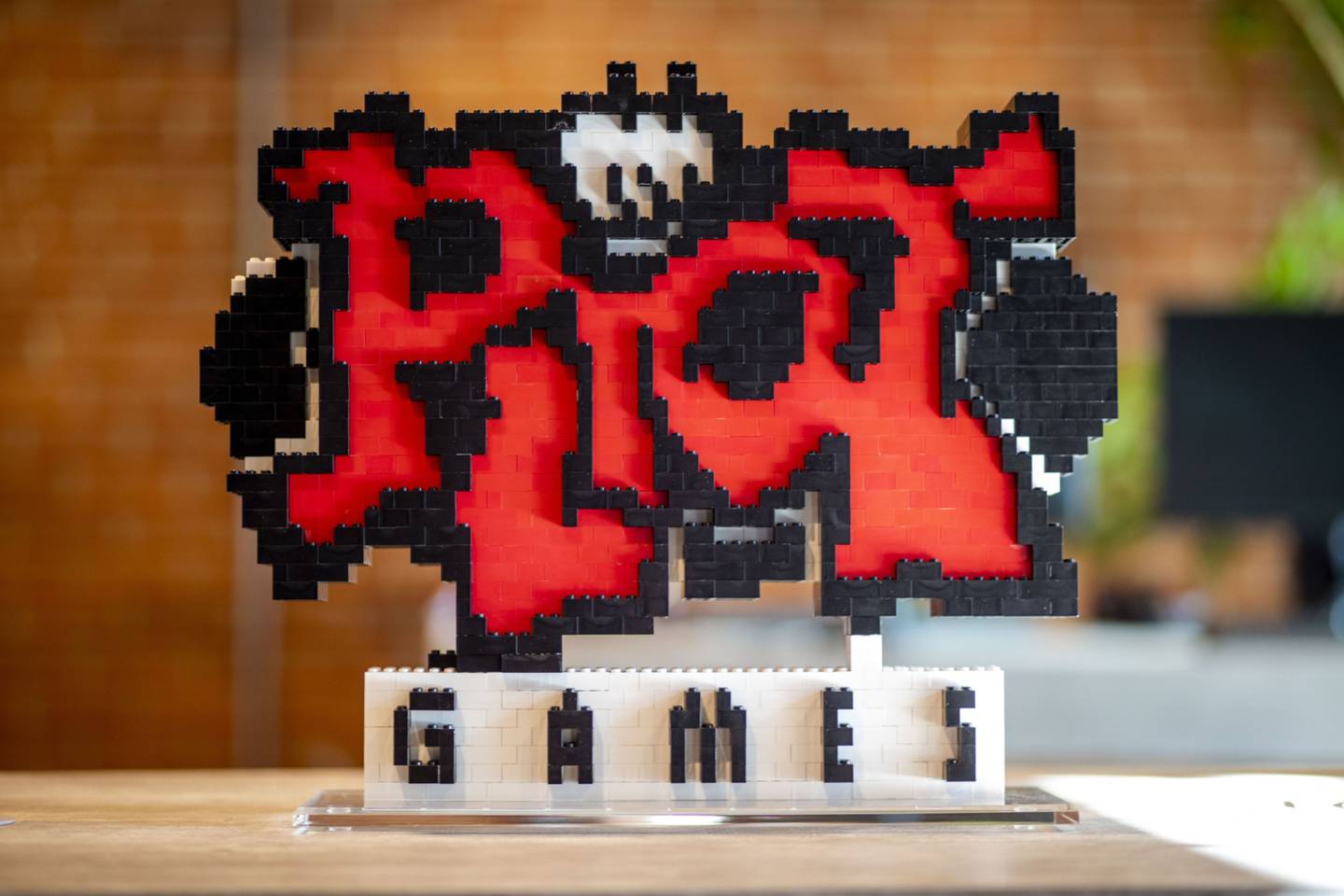 Signage is displayed on a table at the Riot Games Inc. campus in Los Angeles, California, U.S.