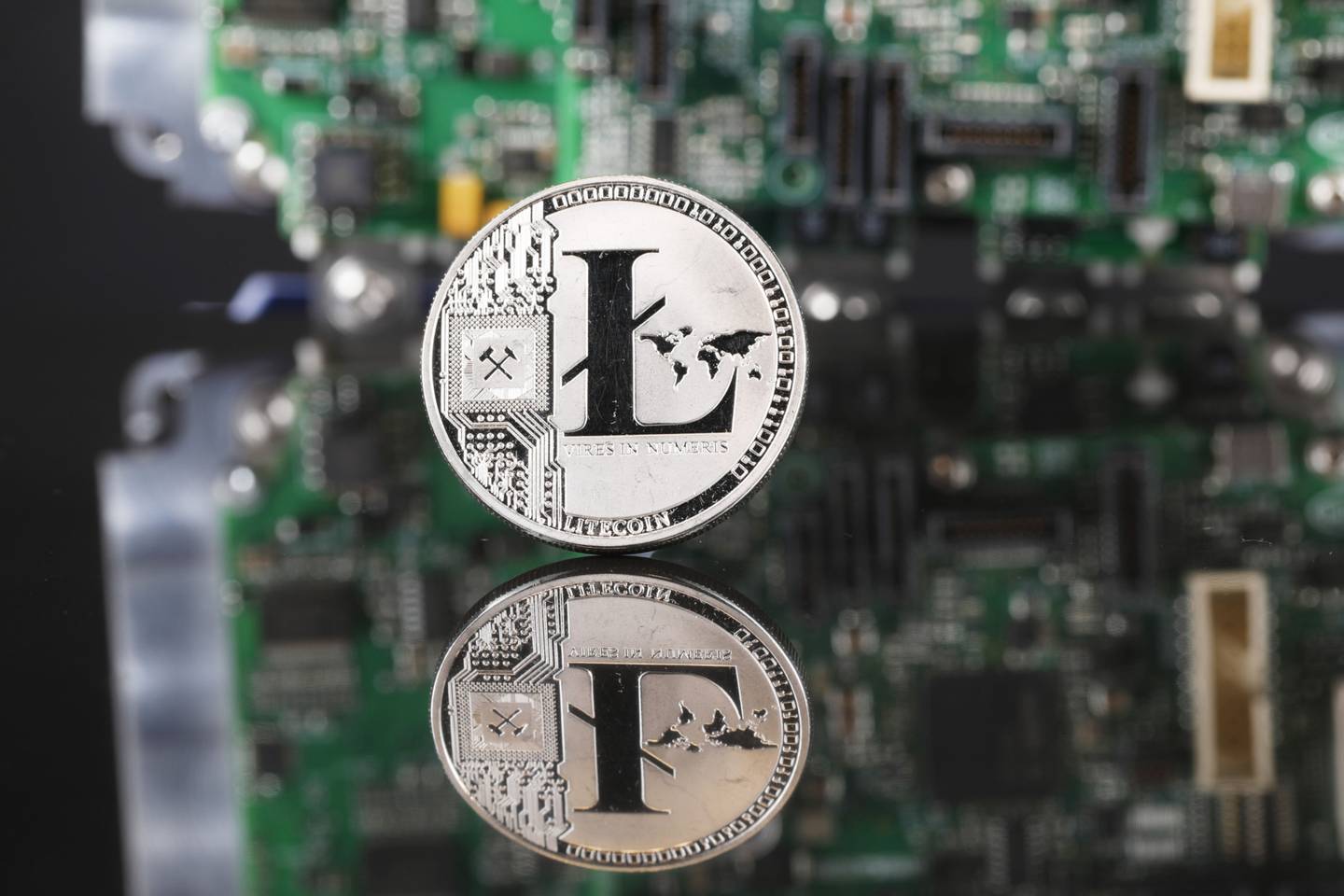 A coin representing Litecoin cryptocurrency in London, U.K.