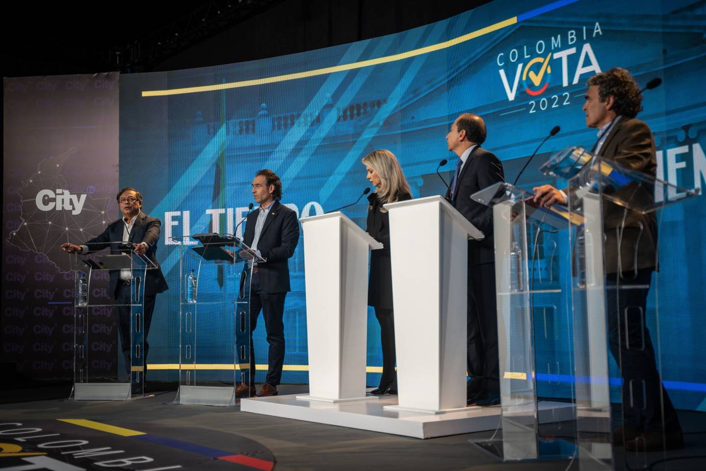 Gustavo Petro, the left-wing presidential candidate leading the polls for the Colombia Humana party (left), with Federico Gutiérrez, candidate for the Creemos (second from left), and Sergio Fajardo, the Coalición Centro Esperanza canidate (far right), during a debate in Bogotá on May 23, 2022.