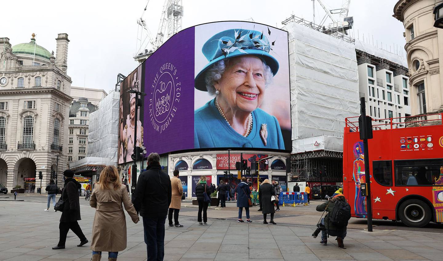 A portrait of Queen Elizabeth II is displayed on the large screen at Piccadilly Circus to mark the start of the Platinum Jubilee.