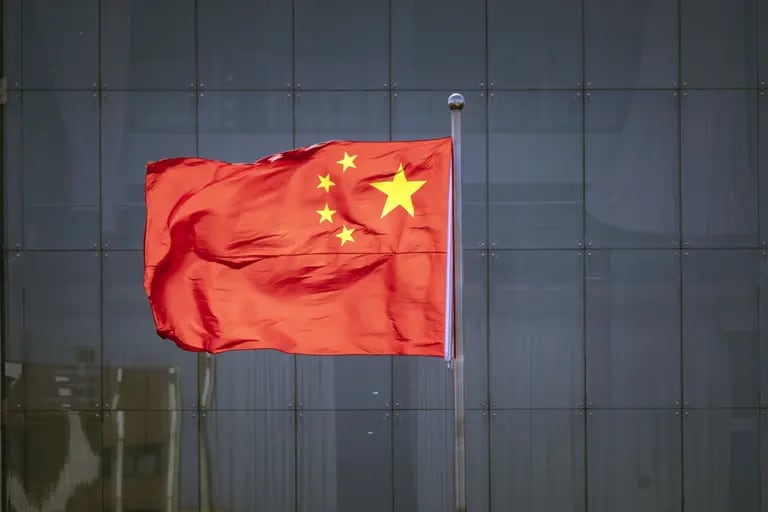 A Chinese flag flying in Beijing, on March 4, 2022. dfd