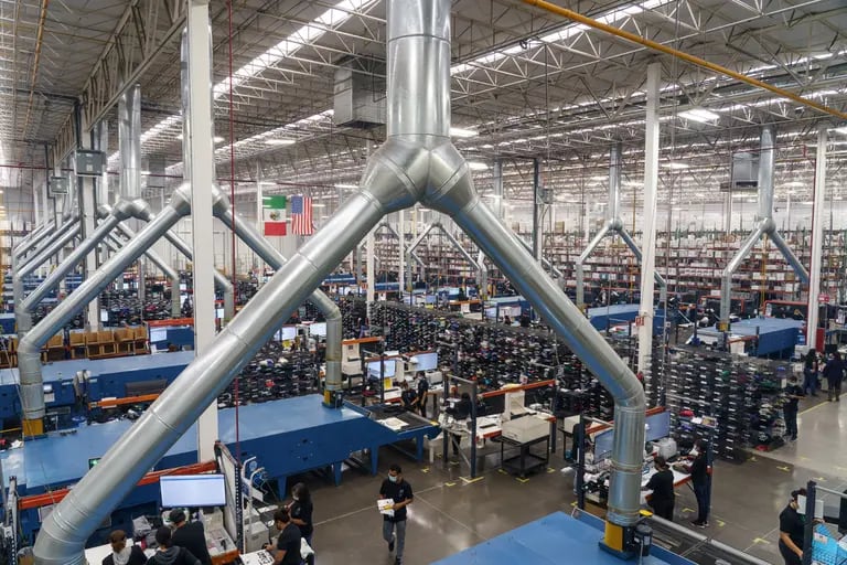 En la fábrica de TSC Miami en Juárez, los trabajadores diseñan e imprimen camisetas. Fotógrafo: Paul Ratje / Bloombergdfd