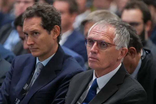 John Elkann, chairman of Stellantis NV, left, and Carlos Tavares, chief executive officer of Stellantis NV, during the inauguration of the Automotive Cells Company (ACC) gigafactory in Douvrin, France, on Tuesday, May 30, 2023