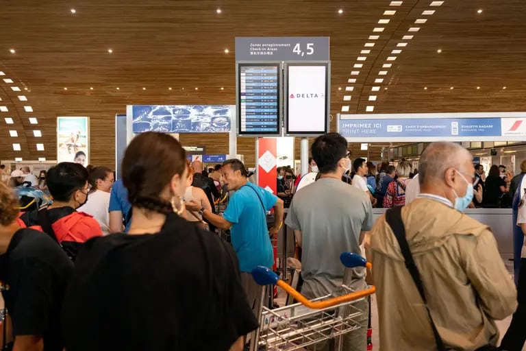 Queues of passengers in the departure hall during a strike by airport workers at Charles de Gaulle airport in Paris, France.dfd