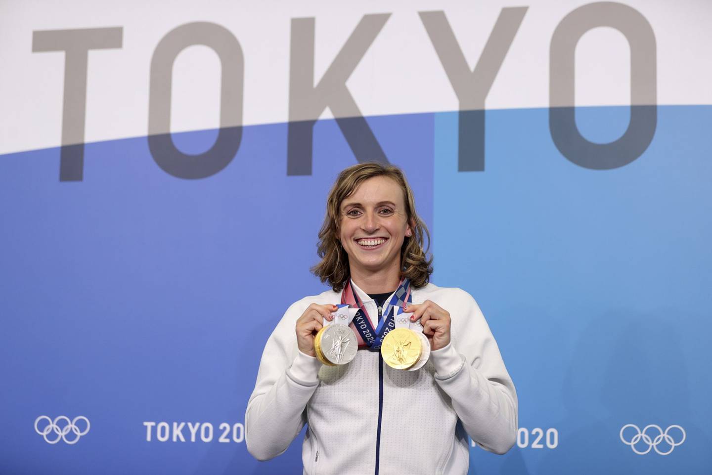 TOKYO, JAPAN - JULY 31: Katie Ledecky of Team USA poses with her two Gold and two Silver medals after a giving a press conference to the media during the Tokyo Olympic Games on July 31, 2021 in Tokyo, Japan.