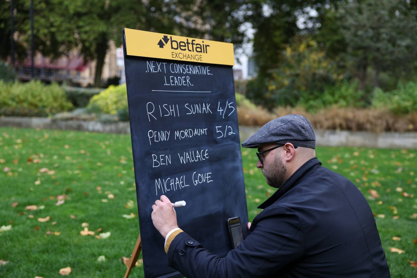 A bookmaker writes the voting odds for the next leader of the Conservative Party, and future UK prime minister, in the Westminster district of London, UK.