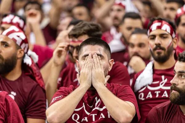 Qatar fans watch their opening match of the FIFA World Cup against Ecuador at Al Bayt Stadium on Nov. 20.