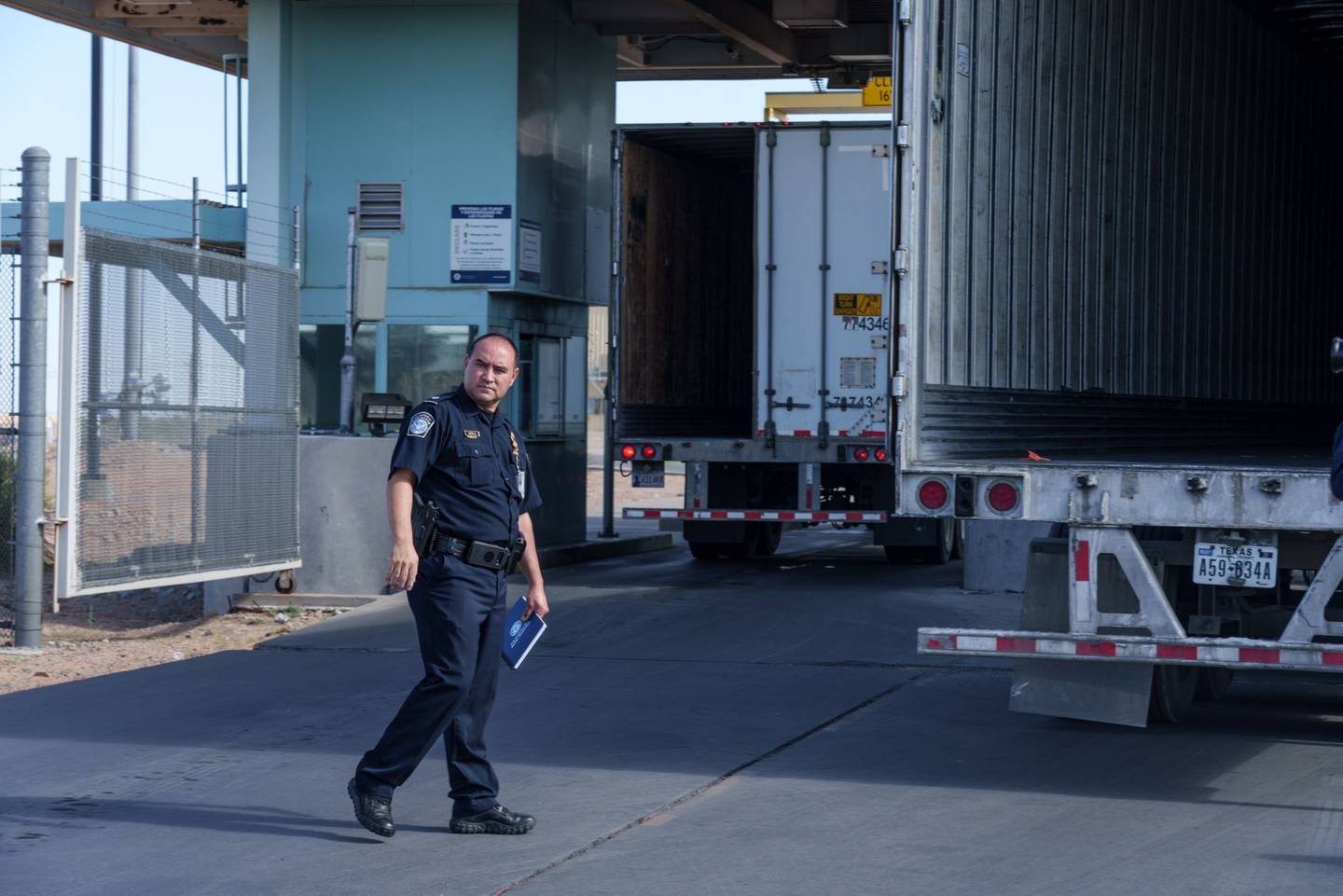 Juan Carrillo, assistant port director at the Santa Teresa Port of Entry, walks near an inspection area for commercial cargo in Santa Teresa, New Mexico on Wednesday, August 10, 2022.dfd