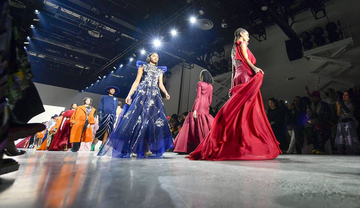 Models walk the runway at a show during New York Fashion Week in Feb. 2022.