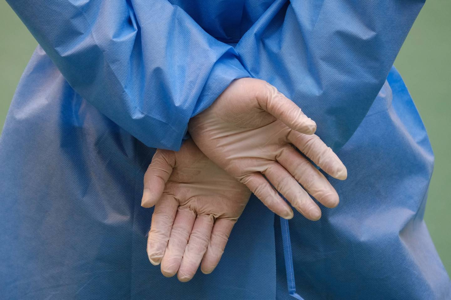 A doctor is dressed in full personal protective equipment. Photographer: Roy Liu/Bloomberg
