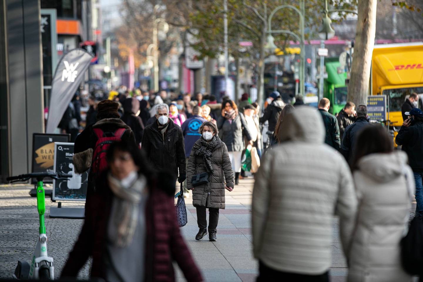 Shoppers wear protective face masks on Kurfrstendamm, in Berlin.