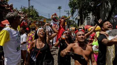 Revelers at a bloco street party during Carnival celebrations in Rio de Janeiro.