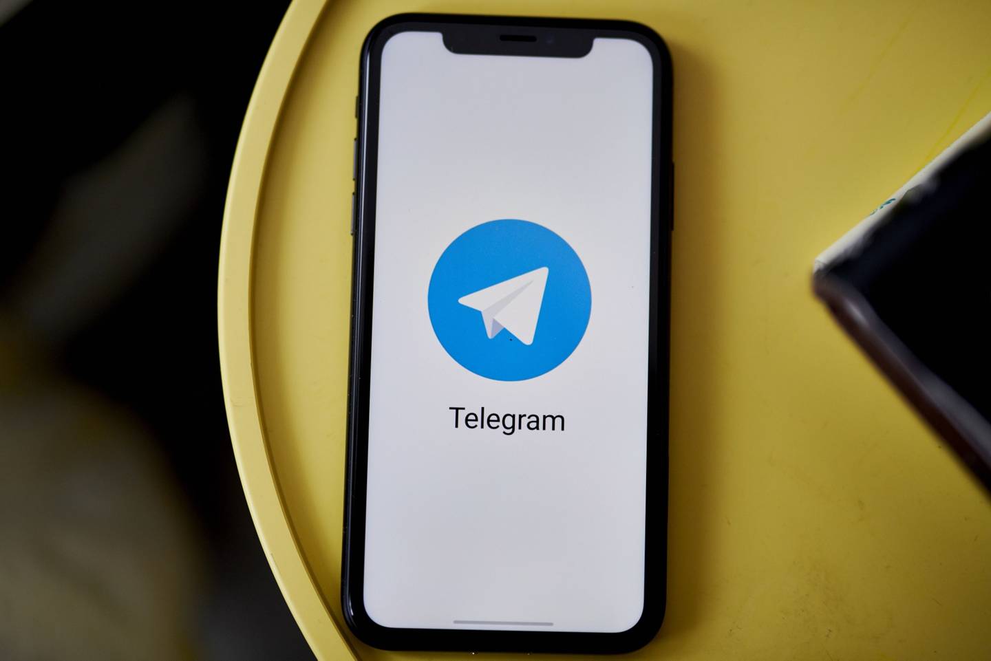 The Telegram logo on a smartphone arranged in the Brooklyn Borough of New York, U.S., on Tuesday, Oct. 5, 2021. Signal and Telegram, two private messenger apps, saw downloads and user sign-ups soar during the extended downtime of Facebook Inc.s network of apps and services. Photographer: Gabby Jones/Bloomberg