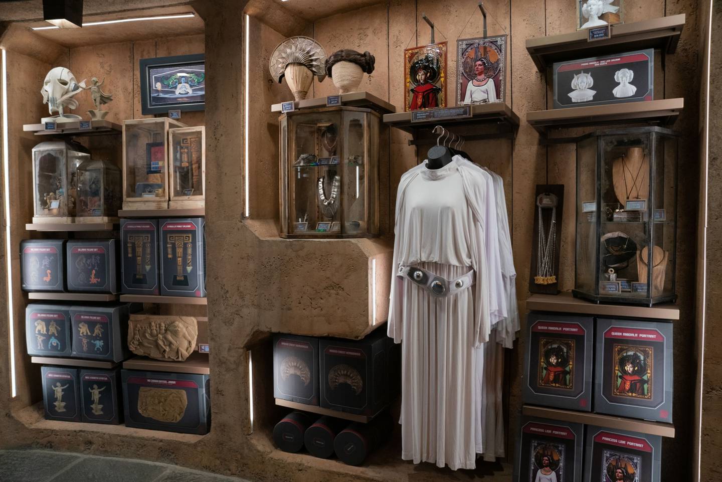 Star Wars merchandise for sale inside a gift shop in the Star Wars: Galaxy's Edge themed area during the reopening of the Disneyland theme park in Anaheim, California, U.S., on Friday, April 30, 2021. Walt Disney Co.s original Disneyland resort in California is sold out for weekends through May, an indication of pent-up demand for leisure activities as the pandemic eases in the nations most-populous state. Photographer: Bing Guan/Bloombergdfd