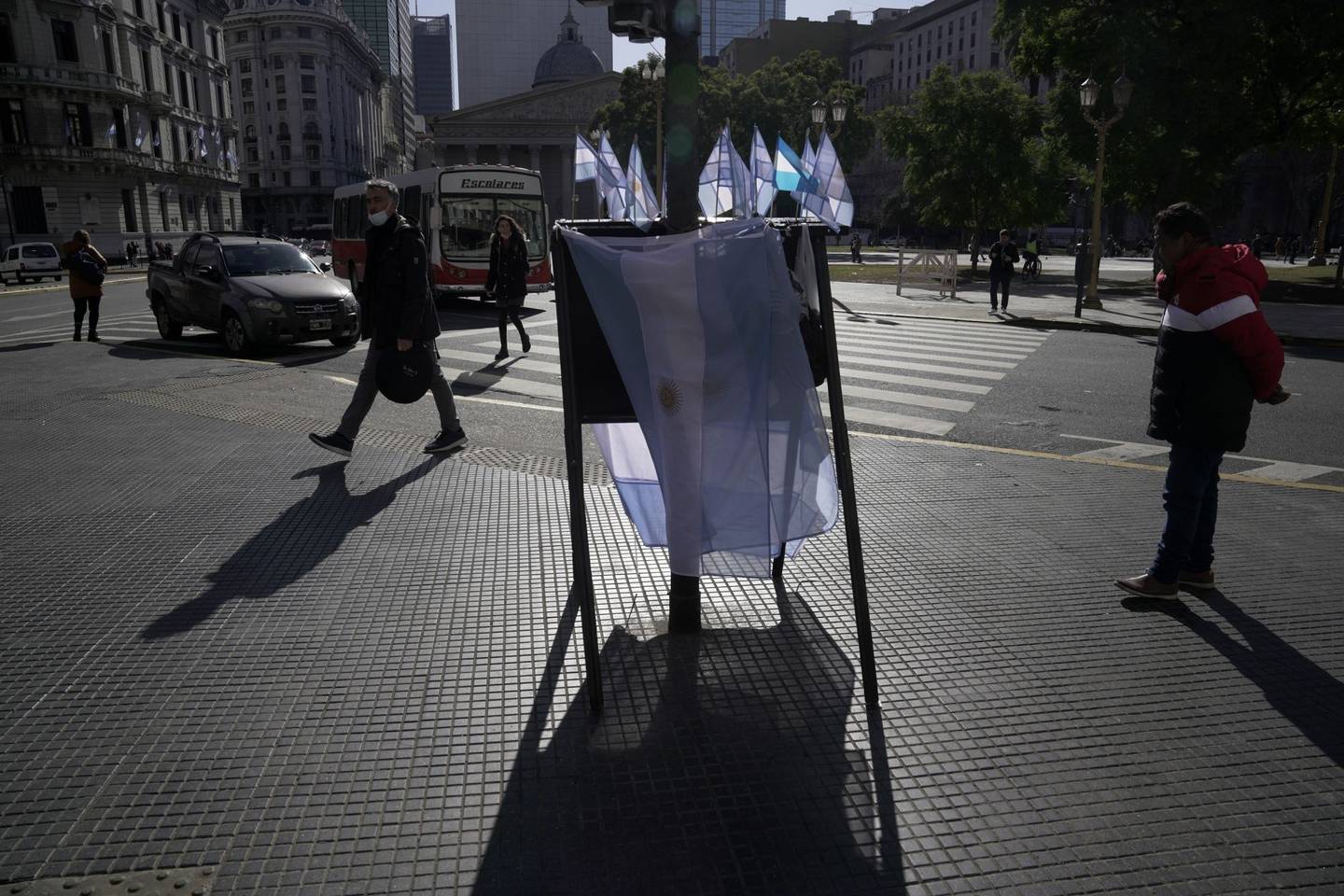 A street vendor sells Argentinian flags in Buenos Aires downtown, Argentina.
