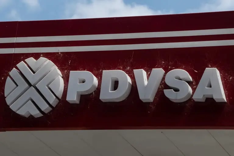 Signage outside a Petroleos de Venezuela SA (PDVSA) gas station in Caracas, Venezuela, on Wednesday, April 5, 2023dfd
