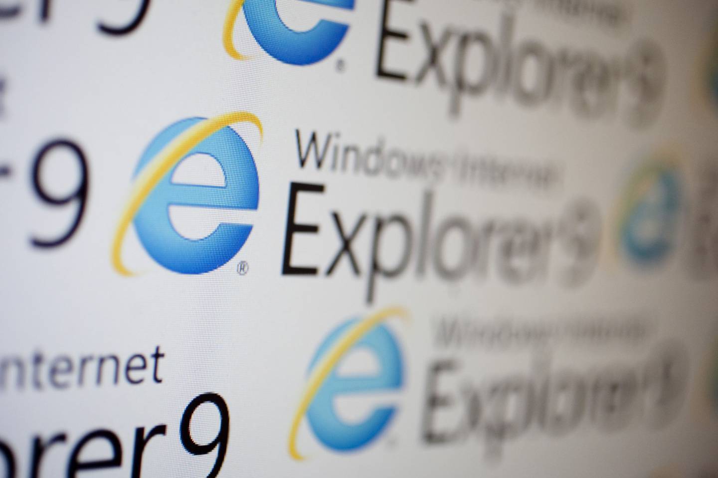 The logo of Microsoft Corp.'s Internet Explorer 9 is displayed on a computer monitor in Washington, D.C., U.S., on Tuesday, March 15, 2011. Microsoft released a speedier version of its Internet Explorer browser that adds privacy controls and video features, a bid to regain market share lost to Firefox and Google Inc.'s Chrome. Photographer: Andrew Harrer/Bloomberg