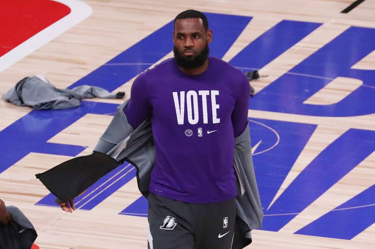 LeBron James #23 of the Los Angeles Lakers wears a VOTE shirt during warm-up prior to the start of the game against the Miami Heat in Game Five of the 2020 NBA Finals at AdventHealth Arena at the ESPN Wide World Of Sports Complex on October 9, 2020 in Lake Buena Vista, Florida.