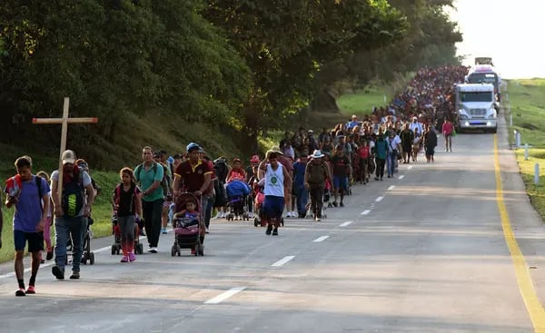 Migrants heading in a caravan to the US, walk towards Mexico City to request asylum and refugee status in Mapastepec, Chiapas State, Mexico, on November 1, 2021.