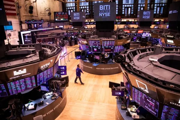 A trader on the floor of the New York Stock Exchange (NYSE) in New York, US. Photographer: Michael Nagle/Bloomberg