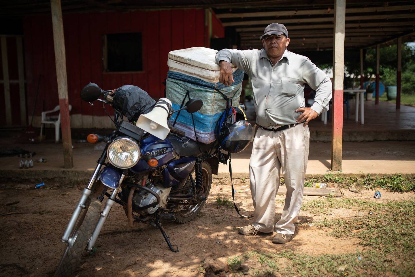 Richar Ortiz, a former coca farm, now sells ice cream from his motorbike near El Capricho. Photographer: Ivan Valencia/Bloombergdfd