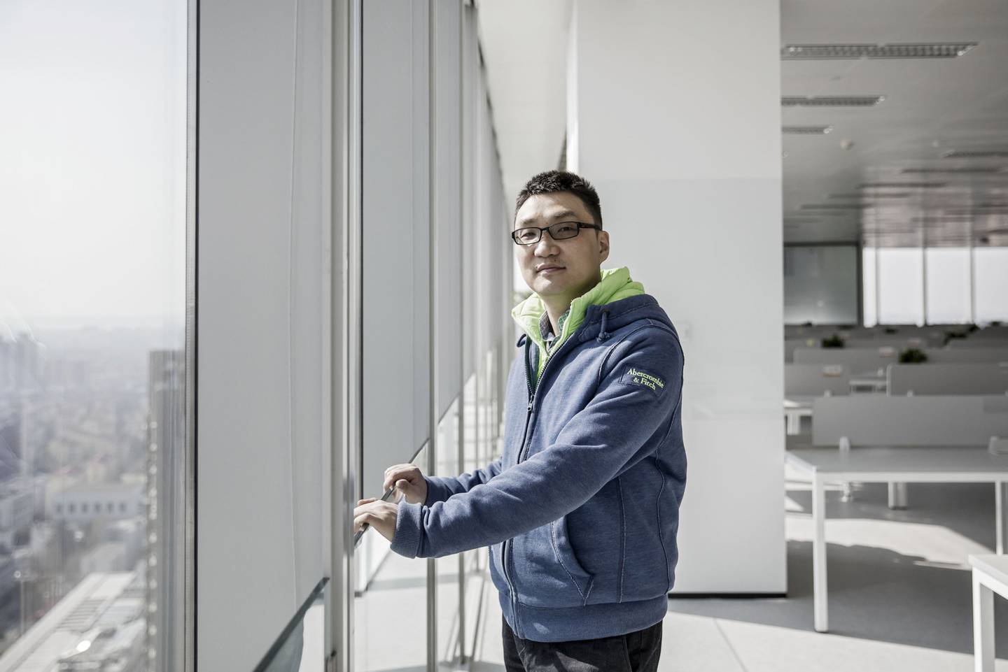 Colin Huang, chief executive officer and founder of Pinduoduo, poses for a photograph at the company's office in Shanghai, China.