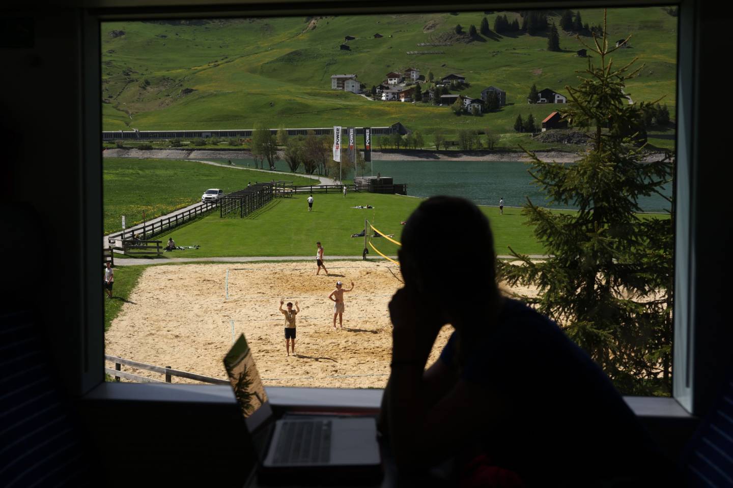 People playing beach volleyball in Davos, May 21.dfd