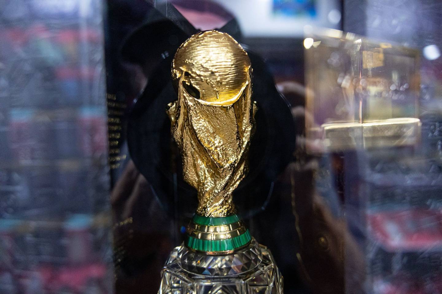 A replica of the World Cup for sale as an officially licensed product at the BudX FIFA Fan Festival at Dubai Harbour in Dubai, United Arab Emirates, on Tuesday, Nov. 29, 2022. Doha is expected to welcome more than 1 million fans during the FIFA World Cup 2022, but many of them will be staying in Dubai and other surrounding cities, taking shuttle flights in for the day.dfd