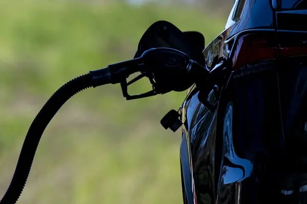 A fuel nozzle in a car at a gas station. Photographer: David Paul Morris/Bloomberg