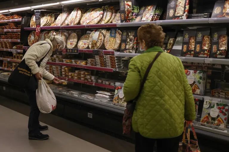 Shoppers browse items from the Italian cuisine range inside a Marks & Spencer Group Plc store in Norwich, U.K. Photographer: Hollie Adams/Bloombergdfd