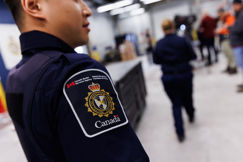 A Canada Border Services Agency (CBSA) officer during a tour of the agency's commercial air cargo facility in Mississauga, Ontario, Canada, on Wednesday, Feb. 19, 2025. The Canadian government has pulled the countrys banks into the fight against fentanyl, recruiting them to join a money-laundering intelligence group that aims to cut off the funds that support trafficking of the deadly drug. Photographer: Cole Burston/Bloomberg A Canada Border Services Agency (CBSA) officer during a tour of the agency's commercial air cargo facility in Mississauga, Ontario, Canada, on Wednesday, Feb. 19, 2025. The Canadian government has pulled the countrys banks into the fight against fentanyl, recruiting them to join a money-laundering intelligence group that aims to cut off the funds that support trafficking of the deadly drug. Photographer: Cole Burston/Bloomberg