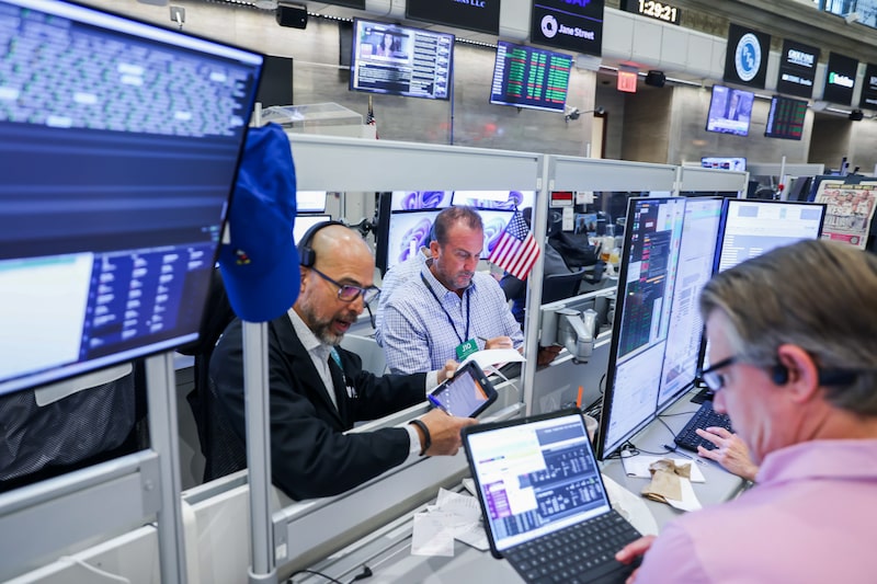 Traders At The New York Stock Exchange Traders At The New York Stock Exchange