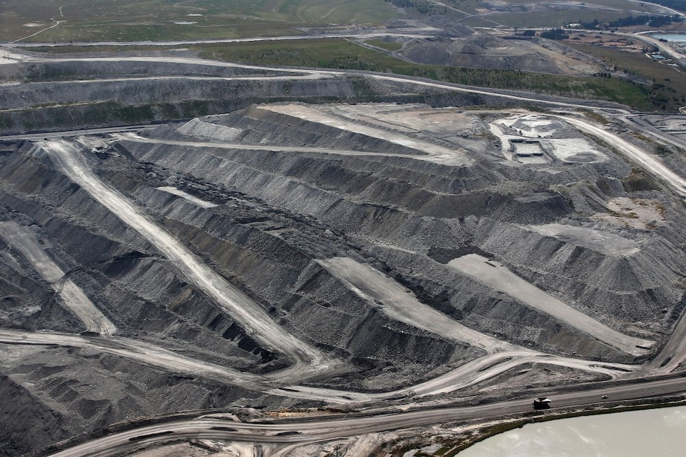 Un camión de volteo circula por una vía de transporte junto a una mina a cielo abierto en las operaciones de Bulga Coal, propiedad de Glencore. Un camión de volteo circula por una vía de transporte junto a una mina a cielo abierto en las operaciones de Bulga Coal, propiedad de Glencore.