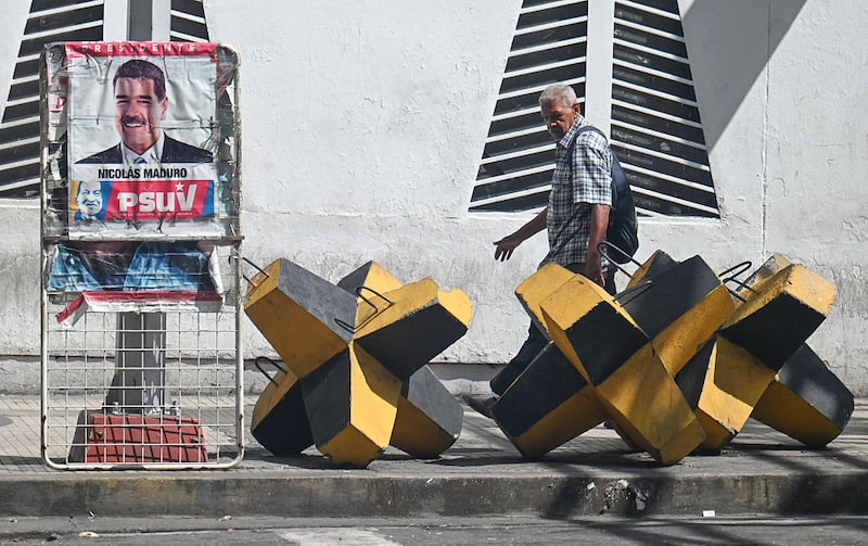 Se condenado pelas acusações, Maduro poderá passar o resto de sua vida atrás das grades com base nas diretrizes de sentença. (Foto: Juan BARRETO / AFP) (Photo by JUAN BARRETO/AFP via Getty Images) Se condenado pelas acusações, Maduro poderá passar o resto de sua vida atrás das grades com base nas diretrizes de sentença. (Foto: Juan BARRETO / AFP) (Photo by JUAN BARRETO/AFP via Getty Images)