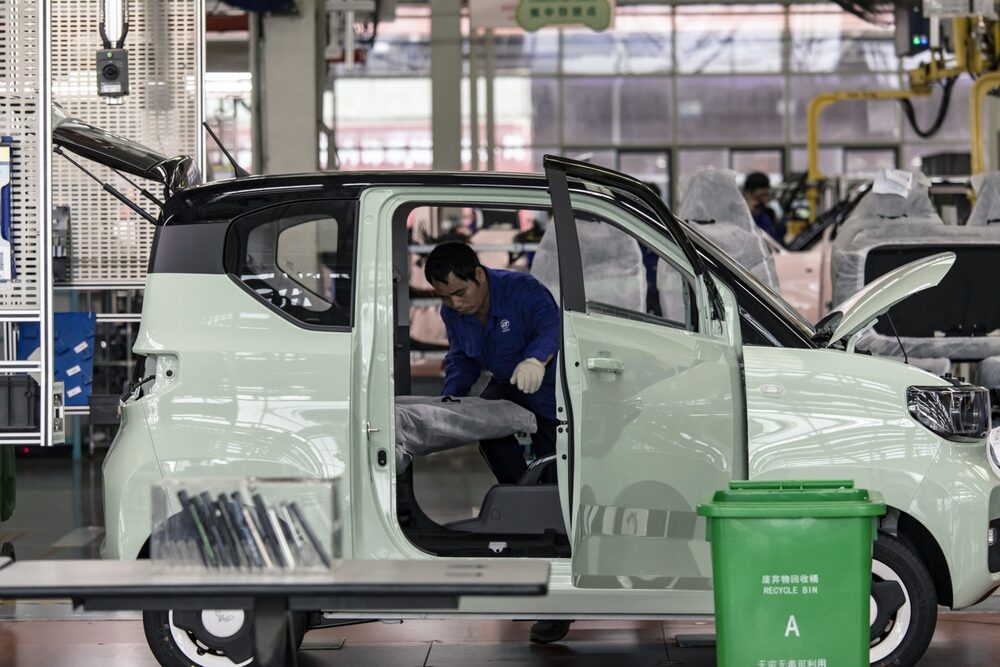 A Wuling Hongguang Mini EV on the assembly line. Photographer: Qilai Shen/Bloomberg A Wuling Hongguang Mini EV on the assembly line. Photographer: Qilai Shen/Bloomberg