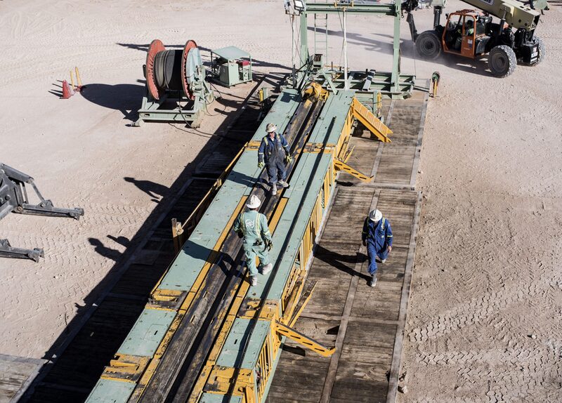Precision Drilling oil rig operators work on a Royal Dutch Shell Plc oil rig near Mentone, Texas, U.S., on Thursday, March 2, 2017. Exxon Mobil Corp., Royal Dutch Shell and Chevron Corp., are jumping into American shale with gusto, planning to spend a combined $10 billion this year, up from next to nothing only a few years ago. Photographer: Matthew Busch/Bloomberg Precision Drilling oil rig operators work on a Royal Dutch Shell Plc oil rig near Mentone, Texas, U.S., on Thursday, March 2, 2017. Exxon Mobil Corp., Royal Dutch Shell and Chevron Corp., are jumping into American shale with gusto, planning to spend a combined $10 billion this year, up from next to nothing only a few years ago. Photographer: Matthew Busch/Bloomberg