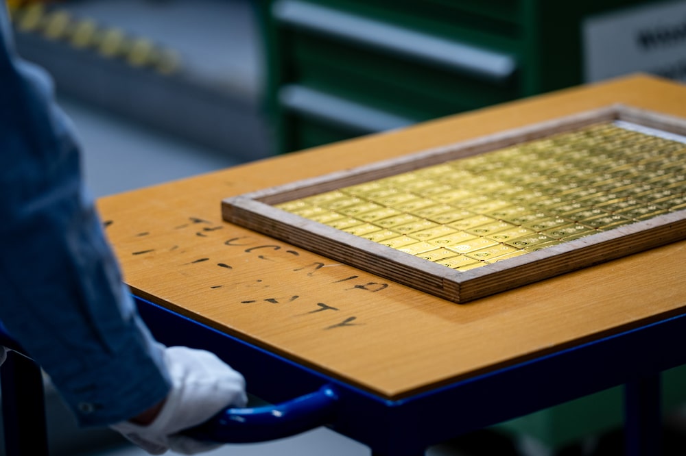 A tray of newly minted gold bars at the Polish mint, also known as Mennica Polska SA, in Warsaw, Poland, on Thursday, Feb. 12, 2026. Polands central bank, the worlds biggest reported buyer of gold, is boosting purchases by another 150 tons as it braces for more of the geopolitical instability that has driven prices to record highs. Photographer: Damian Lemanski/Bloomberg A tray of newly minted gold bars at the Polish mint, also known as Mennica Polska SA, in Warsaw, Poland, on Thursday, Feb. 12, 2026. Polands central bank, the worlds biggest reported buyer of gold, is boosting purchases by another 150 tons as it braces for more of the geopolitical instability that has driven prices to record highs. Photographer: Damian Lemanski/Bloomberg